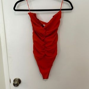 Strapless orange Zara bodysuit. Size medium.